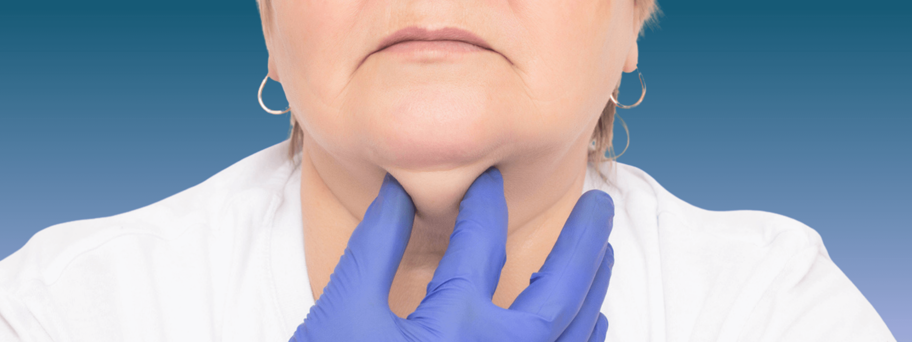 Menopause Fat-Dissolving Injection for Double Chins and Jowls (Belkyra) doctor examining under-chin fat and jowls during consultation