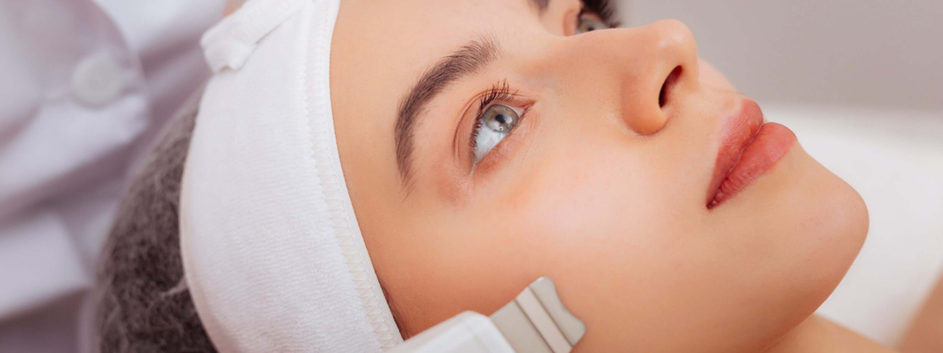 Top Clinics for Laser Treatment in Toronto – woman receiving facial laser skincare treatment at Toronto clinic