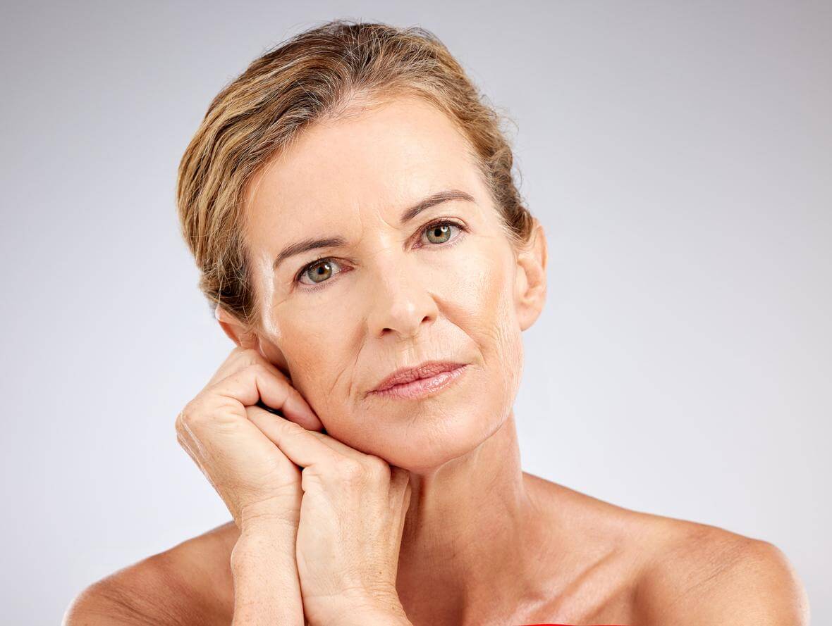 Beautiful Mature Woman with Skincare Routine