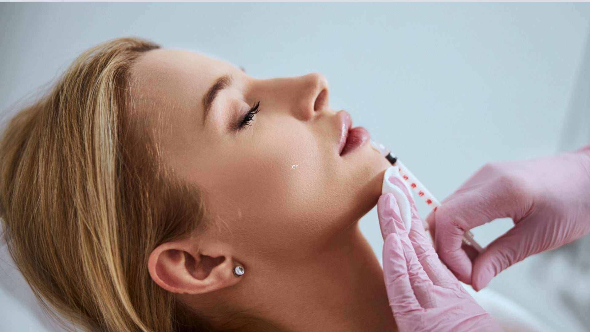 Alt Tag: Local Guide to Facial Fillers and Treatments patient receiving chin filler injection for facial volume restoration and smoothing lines