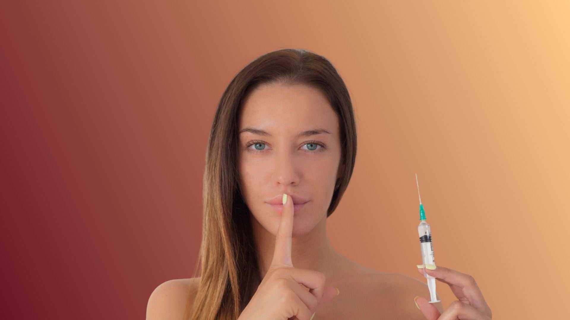woman holding syringe with lip filler gesture indicating secrecy for lip augmentation in Toronto cost and procedure guidance