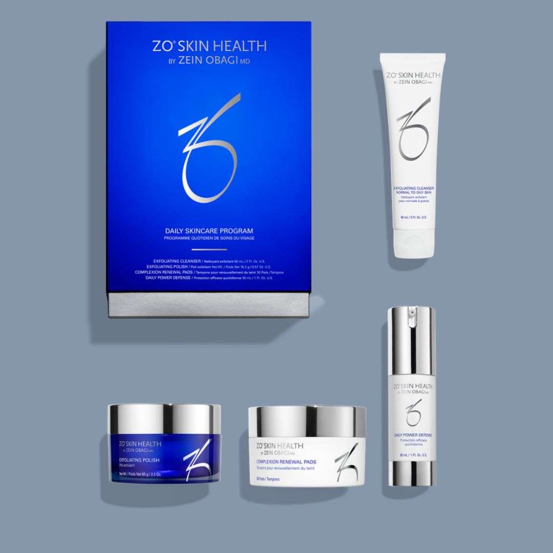 ZO Daily Skincare Program set with exfoliating cleanser, polish, renewal pads, and antioxidant serum on gray background