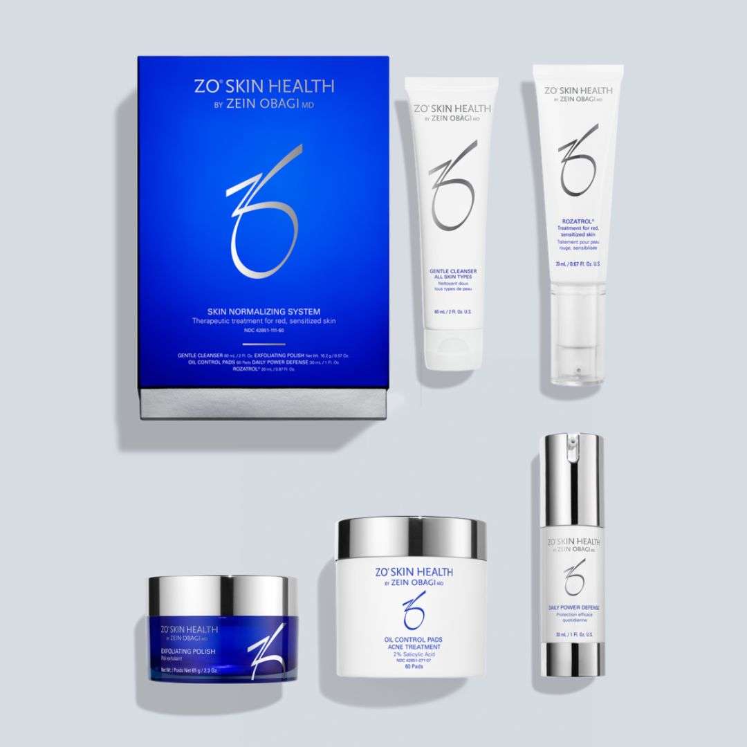 ZO Skin Normalizing System skincare set for redness-prone and sensitive skin with cleanser, exfoliating polish, oil control pads, serum, and daily defense.