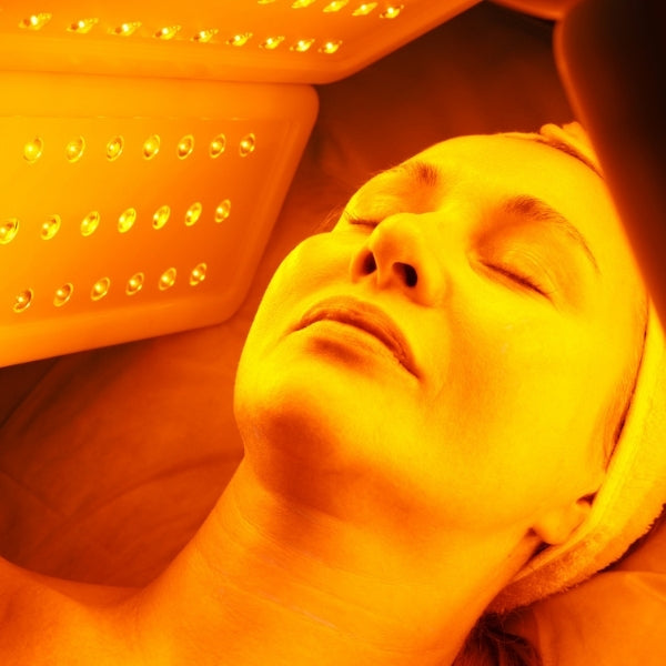 Clinical-grade Healite LED phototherapy treatment at Merrion Medical Aesthetics Oakville - dual-wavelength 830nm and 590nm light therapy for skin rejuvenation and post-treatment recovery
